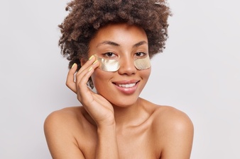 https://www.drlyndouce.com/wp-content/uploads/2018/01/woman-with-curly-hair-applies-beauty-hydrogel-patches-eyes-smiles-gently-stands-topless-white_273609-52524.jpg